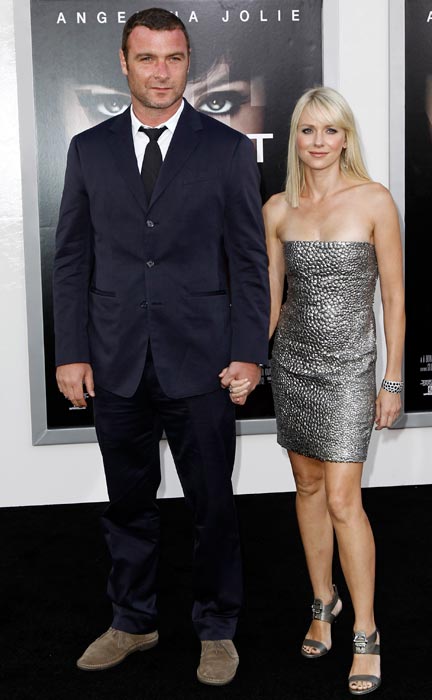 Cast member Liev Schreiber, left, and Naomi Watts arrive at the premiere of "Salt" in Los Angeles, on Monday, July 19, 2010.