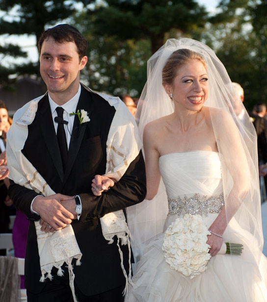 In this handout image provided by Genevieve de Manio, Chelsea Clinton (R) weds Marc Mezvinsky at the Astor Courts Estate on July 31, 2010 in Rhinebeck, New York.