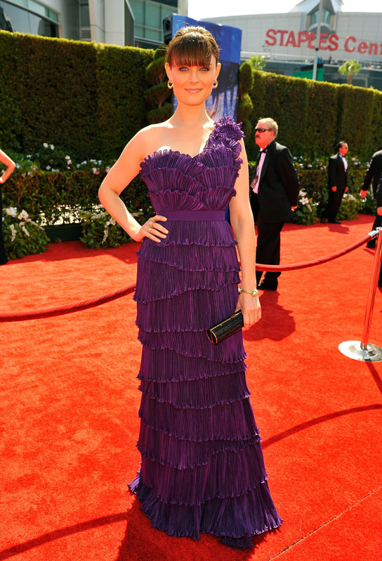 Emily Deschanel opted for a one shoulder Max Azria Atelier one-shouldered purple gown and Neil Lane jewels.